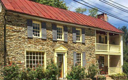 Exterior view of the Canal House, a 1970's stone building